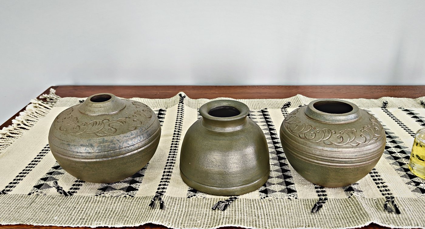 Three reduced stoneware vessels